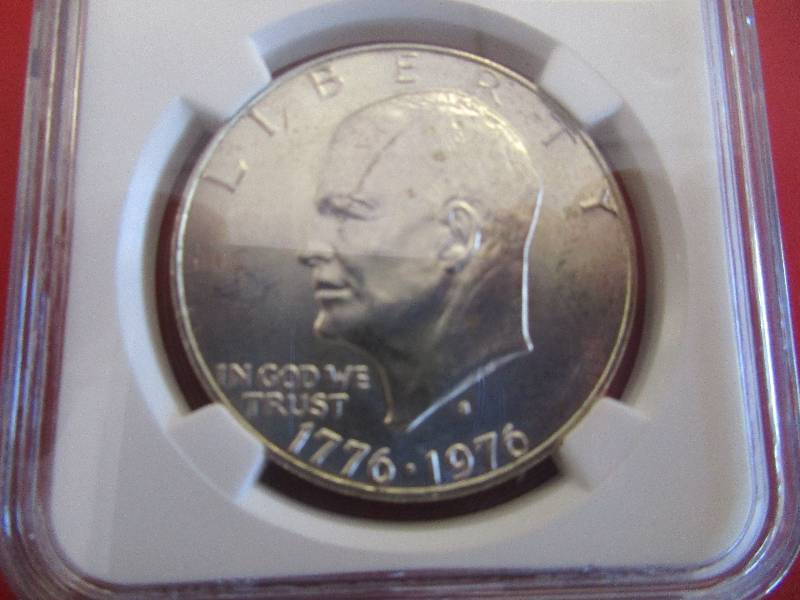 Lot #25 - 1776-1976-S Bicentennial Eisenhower 40% Silver Dollar NGC Certified in Mint State Condition. The Moon and Bell reverse is shown for the 200th Anniversary of the United States.