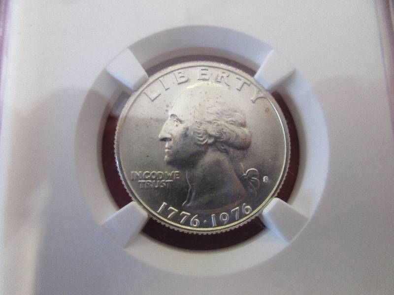 Lot #28 - 1776-1976-S Silver Bicentennial Washington Quarter NGC Certified in Mint State Condition. The coin displays the characteristic liberty drummer design on the reverse for the 200th birthday of the United States.