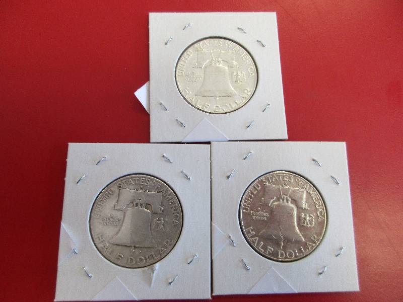 Lot #34 - 1957-D, 1963-P and 1963-D Franklin half Dollars.