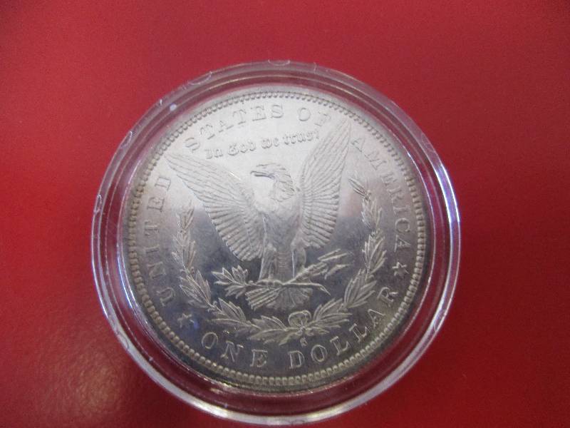 Lot #41 - 1882-S Morgan Silver Dollar in strong BU Condition with cartwheel effect and original mint luster.  Beautiful coin in high quality condition.