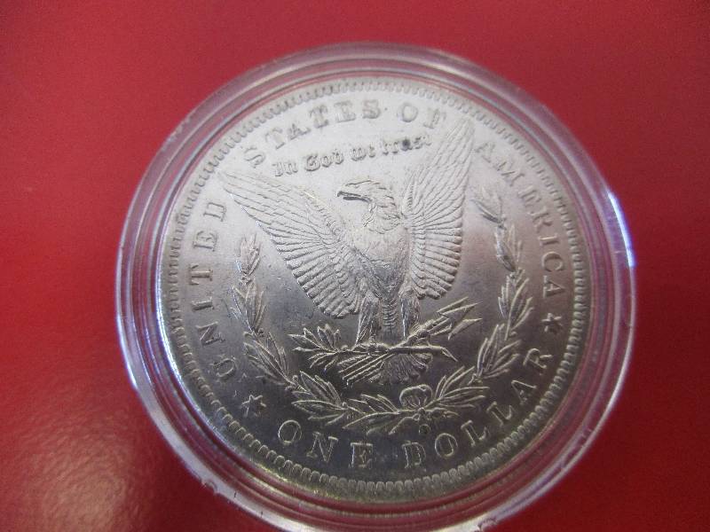 Lot #42 - 1885-O Morgan Silver Dollar in Strong BU Condition with cartwheel effect and original mint luster. Nice coin in high quality condition.