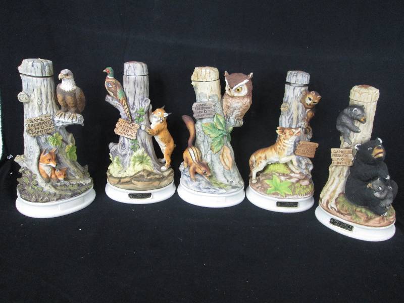 lot 108 image: 5 Hoffman Music Box game Preserve decanters