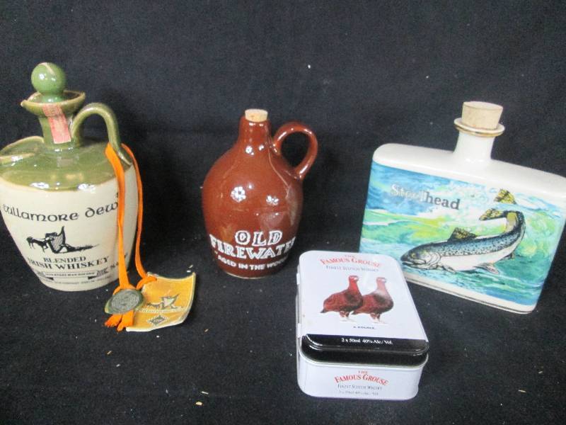 lot 145 image: Assorted Group Whiskey Jugs & Decanters.