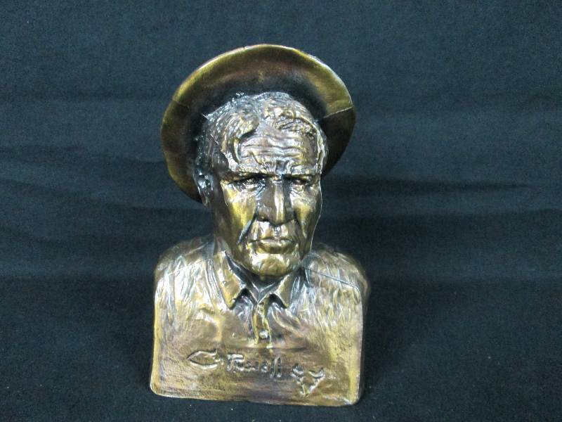 lot 8 image: C M Russell Coin Bank