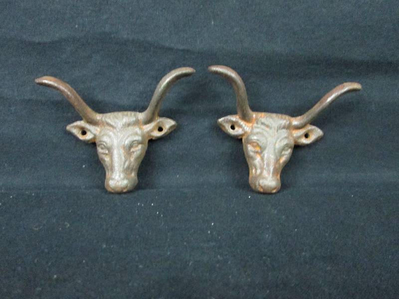 lot 14 image: 2 Cast Iron Steer Head Hooks