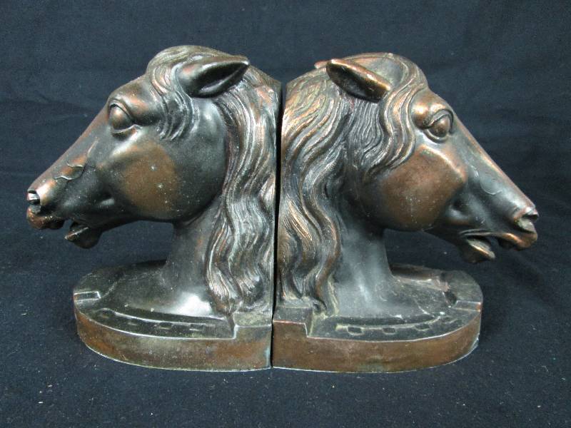 lot 32 image: Copper Tone Horse Head Bookends
