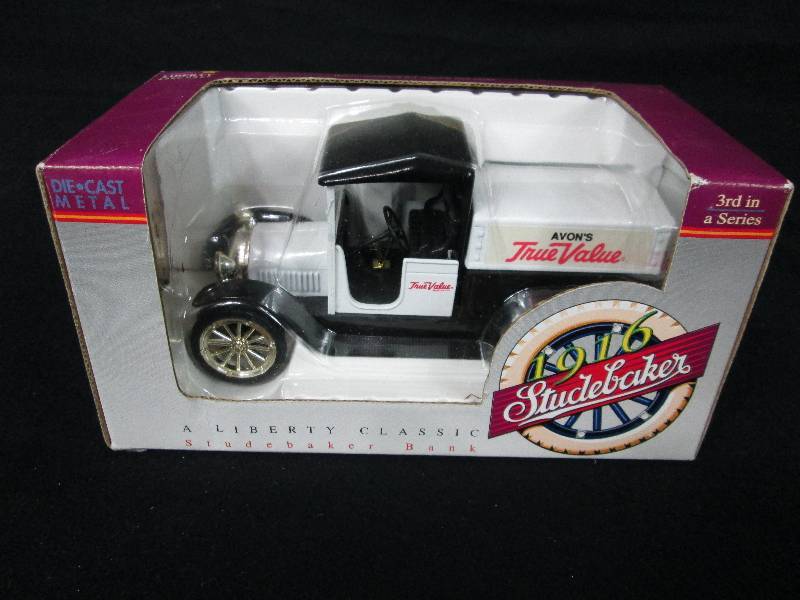 lot 57 image: Liberty Die Cast Coin Bank 1916 Studebaker