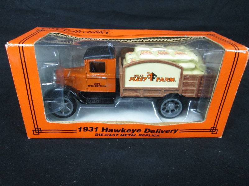 lot 63 image: Ertil Die Cast Coin Bank 1931 Hawkeye