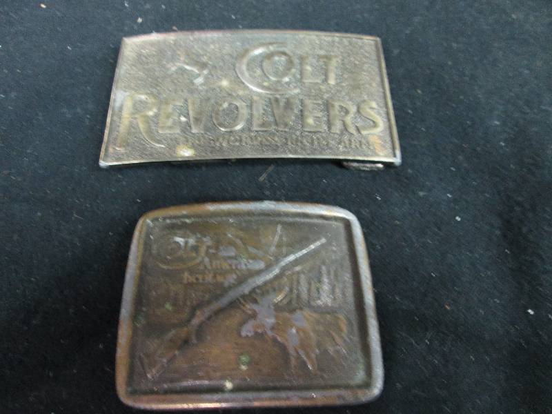 lot 73 image: 2 Colt Firearm Belt Buckles