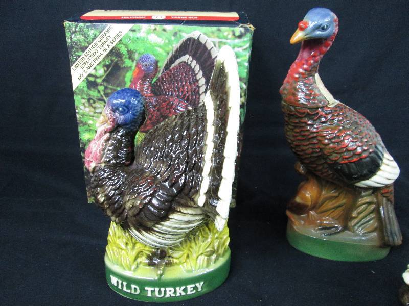 lot 90 image: Wild Turkey Whiskey Decanters  # 4,7  & 8  1 has box.