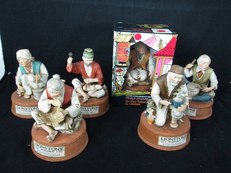 lot 98 image: Lion Stone Decanters Oriental