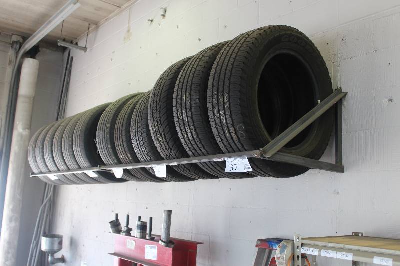 lot 38 image: Wall Mount Tire Rack