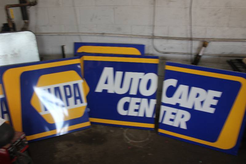 lot 56 image: Drip Pan & NAPA Signs