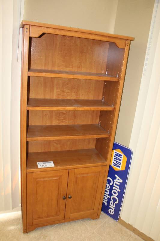lot 186 image: 4-Shelf 2-Door Wood Cabinet
