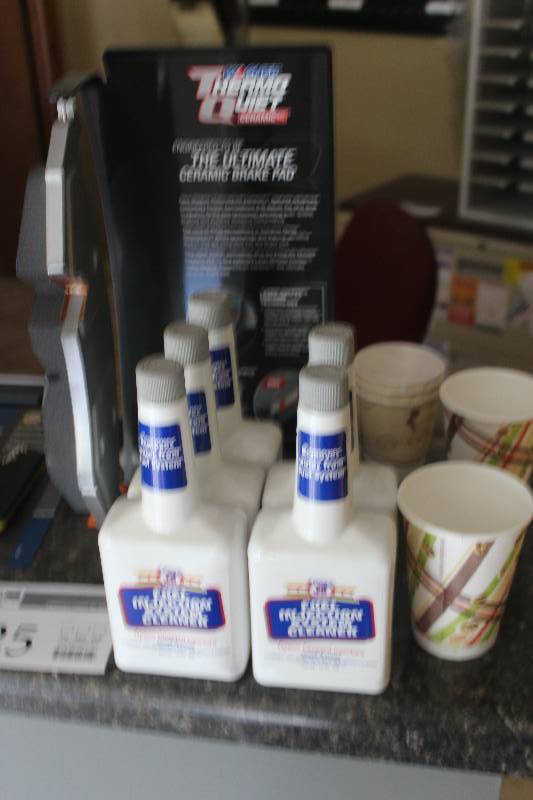 lot 225 image: Shelf Lot of Fuel Injector Cleaners, Brake Pad Display
