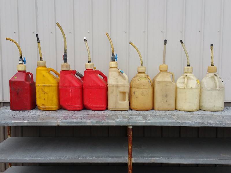 (9) Plastic Racing  Performance Fuel Cans