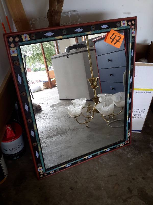 Nice wood framed decorative mirror.. 36in w x 24in.  Nice shape