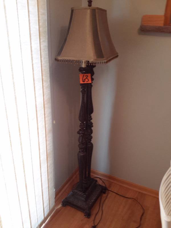 Faux Bronz floor lamp with fancy shade with plastic crystals.  2 bulbs.  67 in h.  Looks like almost new