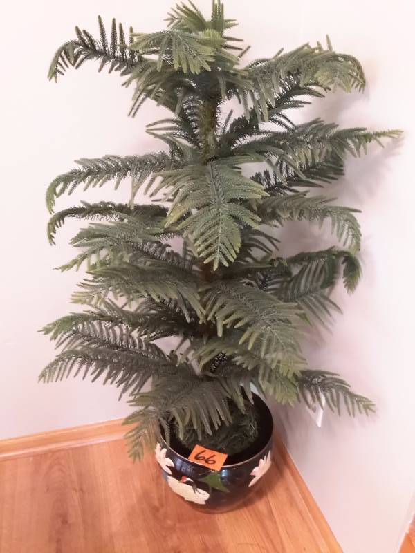 Artificial Norfolk Pine with nice ceramic pot.  48 in h