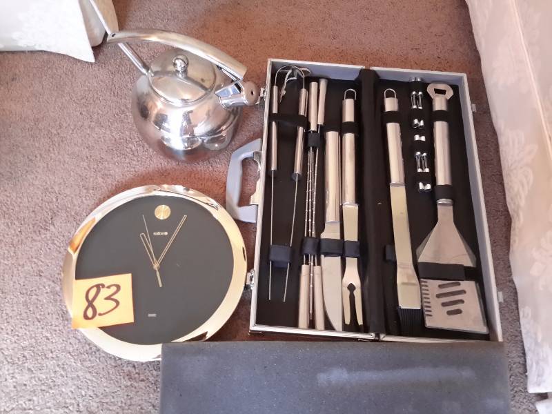Grilling utensil set in case  Chrome Tea pot  Electric wall clock.