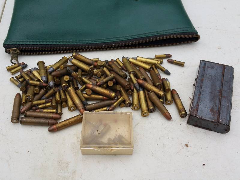 lot 75 image: Group of Various Cartridges, Clip, Green Pouch
