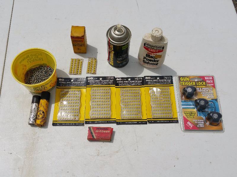 lot 80 image: Vintage Plastic Caps, BBs, Gun Oil, Black Powder Solvent, Etc.
