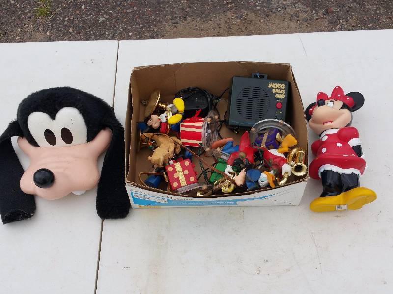 lot 109 image: A nice Disney set  Mickeys Brass Band Set  Goofy Baseball Hat and Minnie Coin Bank