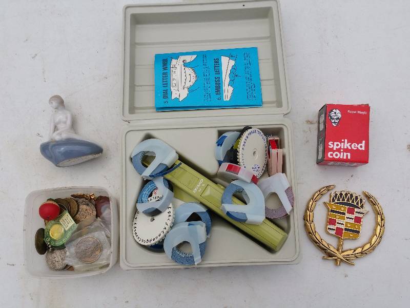 lot 112 image: Mermaid, Cadillac Hood Ornament, Tokens, Label Maker