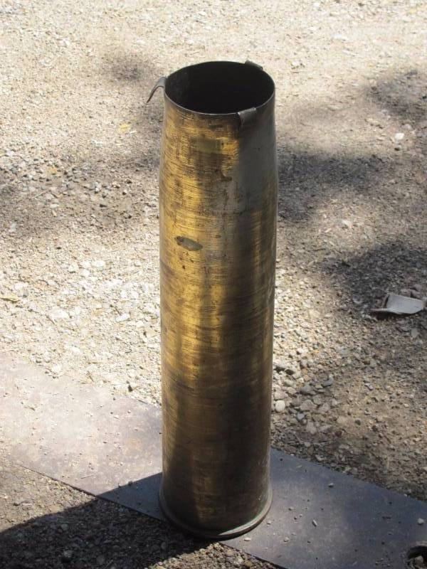 Lot - A collection of two brass artillery shell cases, 14 3/4 in. (37.4  cm); 17 1/2 in. (44.4 cm)