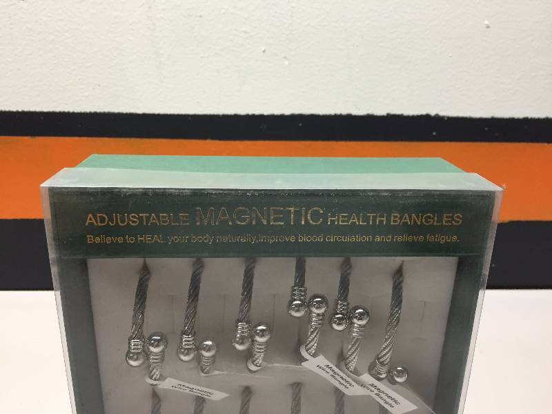 lot 21 image: HEALTH BANGLES ADJUSTABLE