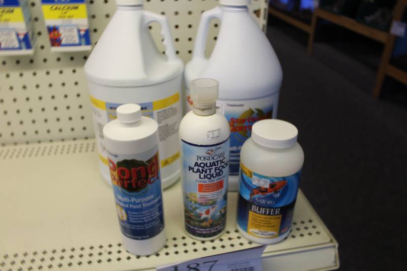 lot 187 image: Lot of Bottles Pond Buffer, Biological Pond Treatment, Aquatic Plant Food, Mag Float Dechlor-ease, Freshwater Multi-Purpose