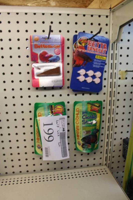 lot 199 image: Half Wall Lot of Aquarium Equipment Including Feed Blocks, Betta Bio-Gold, Cichlid Staple