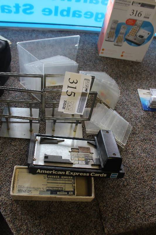 lot 315 image: Lot of Office Supplies Including Credit Card Imprinters, Price Displays
