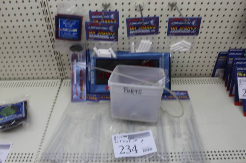 lot 234 image: Half Shelf Lot of Aquarium Equipment Including Air Stones, Tubing, Filter