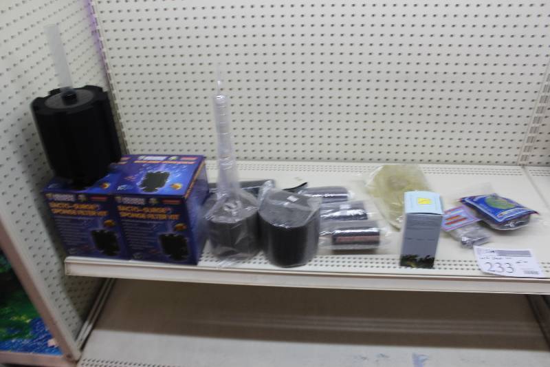 lot 233 image: Half Shelf Lot of Aquarium Equipment Including Air Filters, Carbon Cartridges