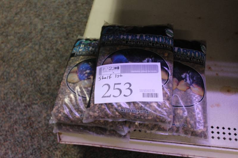 lot 253 image: Shelf Lot of 5lbs Bags of Colored Aquarium Gravel