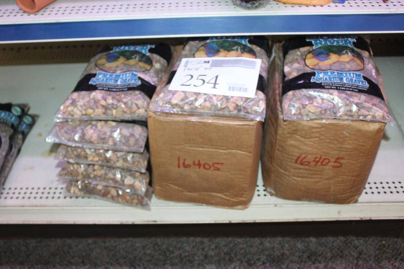 lot 254 image: Shelf Lot of 5lbs Bags of Colored Aquarium Gravel