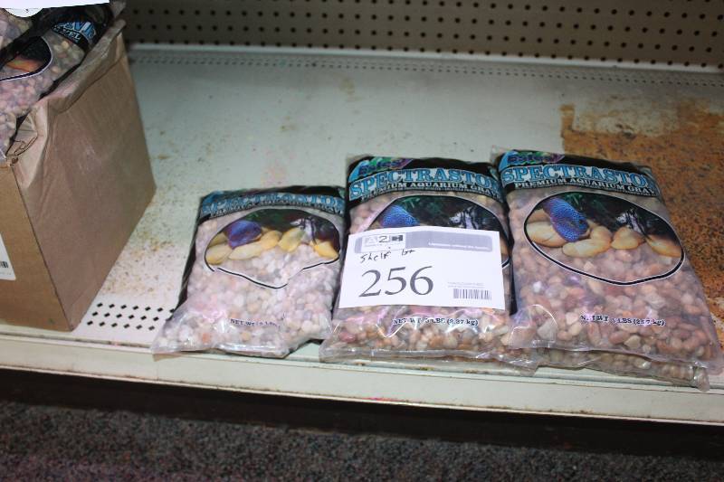 lot 256 image: Shelf Lot of 5lbs Bags of Colored Aquarium Gravel