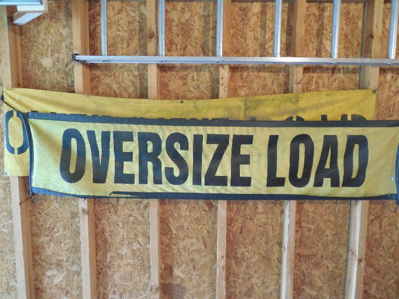 lot 13 image: 2 OVERSIZE LOAD BANNER SIGNS