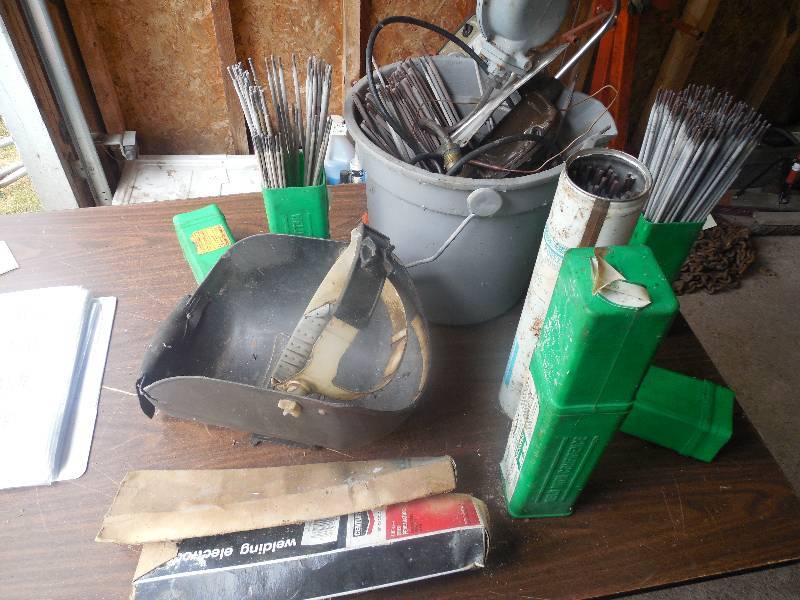 lot 35 image: WELDING RODS AND HELMET
