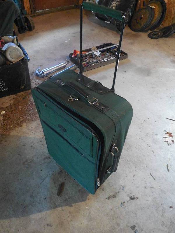 lot 53 image: LUGGAGE TRAVELING SUITCASE