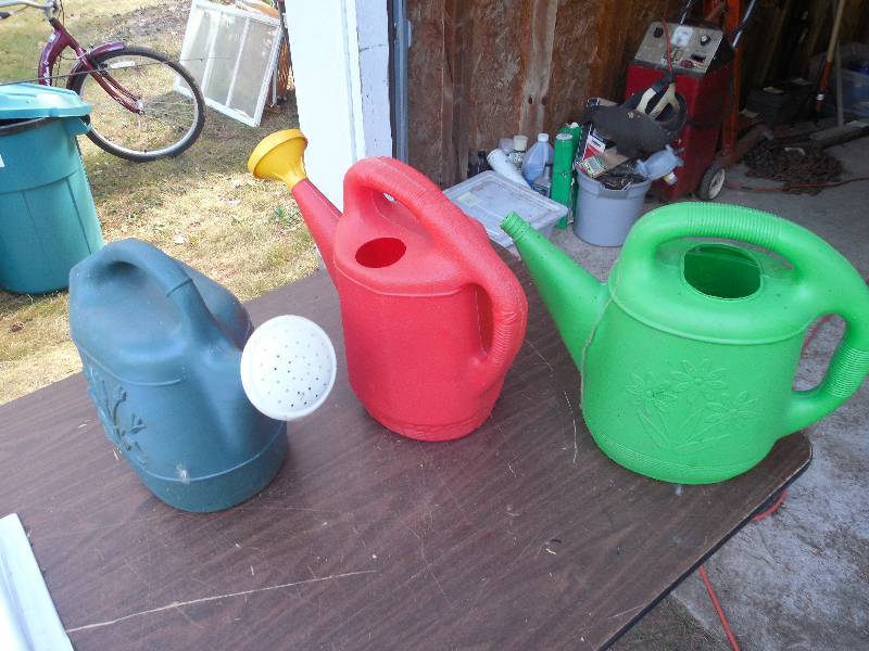 lot 95 image: (3) GARDEN WATER JUGS