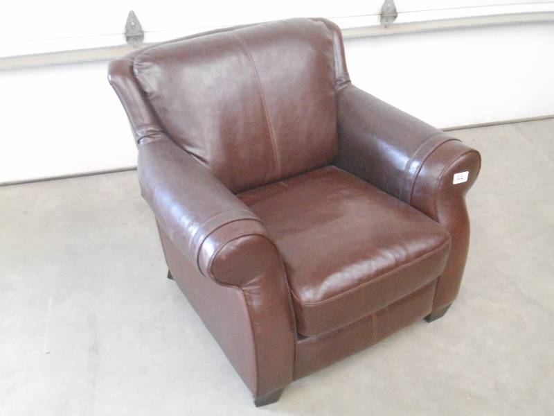 lot 22 image: (1) Cushioned Leather Arm Chair, Us...
