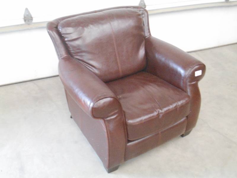 lot 23 image: (1) Cushioned Leather Arm Chair, Us...