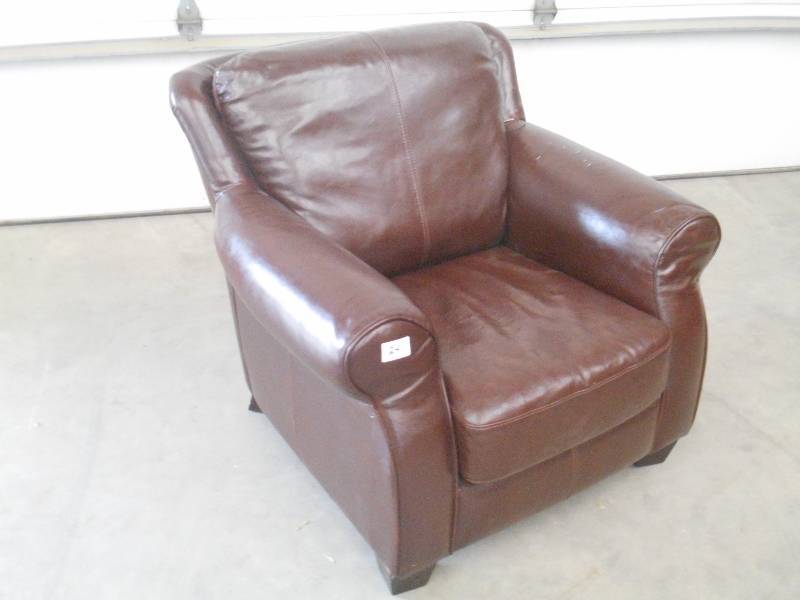 lot 24 image: (1) Cushioned Leather Arm Chair, Us...