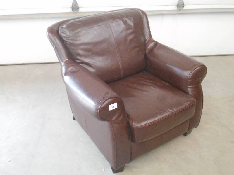 lot 26 image: (1) Cushioned Leather Arm Chair, Us...