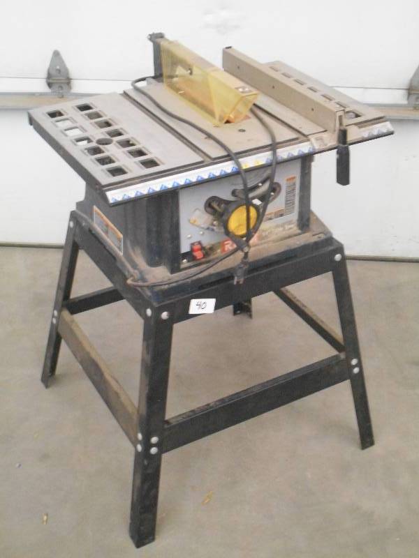 lot 40 image: Ryobi 10 Table Saw Set With Stand,...