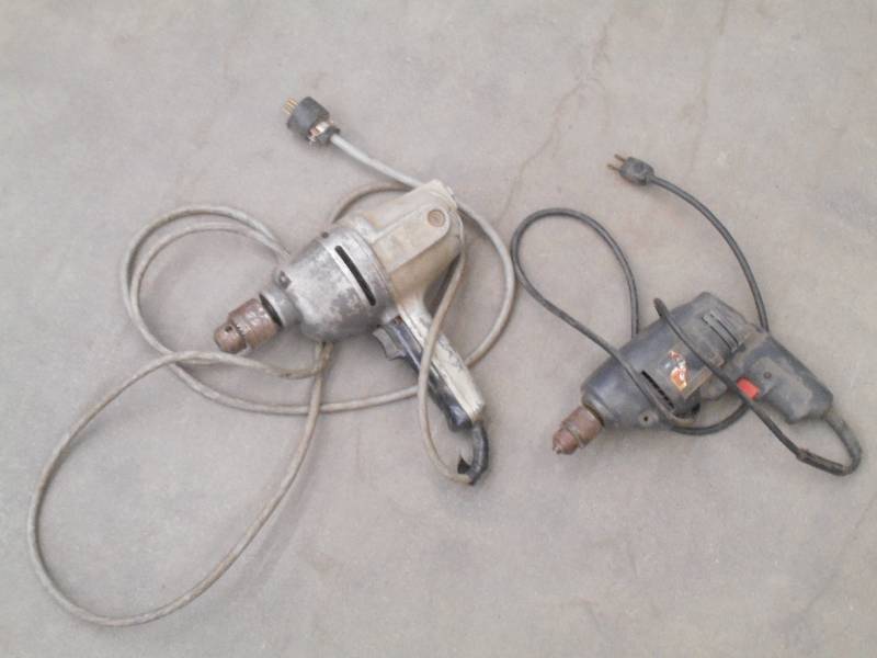lot 51 image: (1) 12 & (1) 38 Electric Drills...