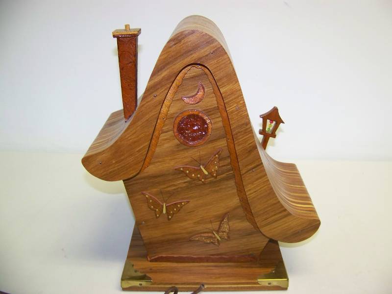 lot 9 image: Wooden, Cottage Design, Electric, Table Top Clock with Night Light and Music Box