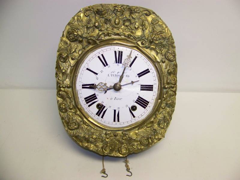 lot 3 image: French Morbier, Wall Hanging Clock with Calendar Dial, Winding Key, Weights and Ornate, Brass Pendulum